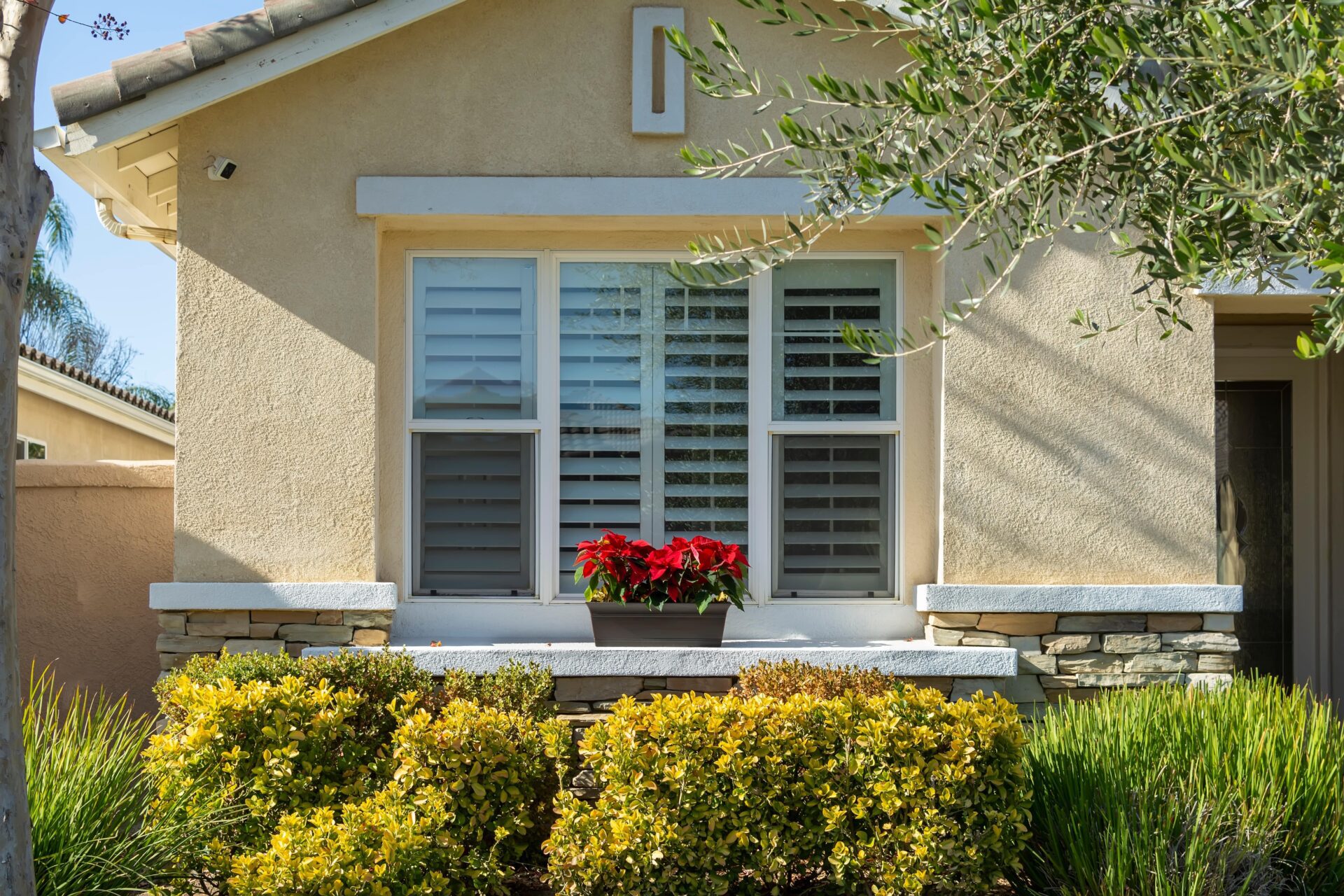 The back window of a home from the outside